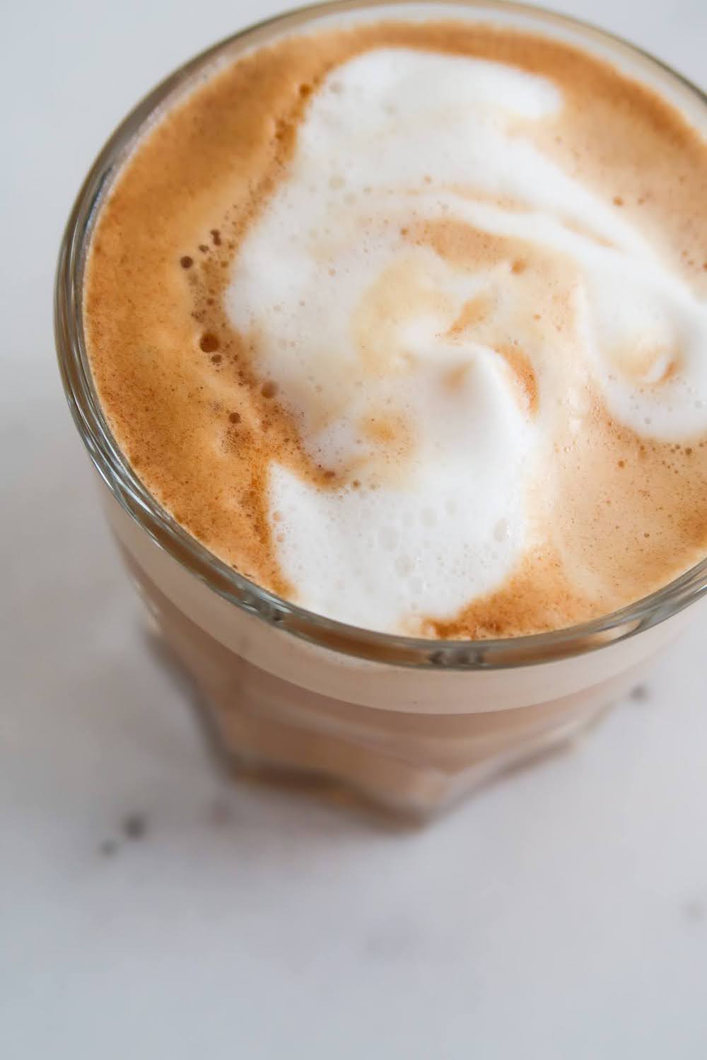 Learn how to make cappuccino or latte at home without a frother or a machine! The result of this super easy cappuccino recipe will be a cup of cappuccino with thick creamy foam that stays a long time.