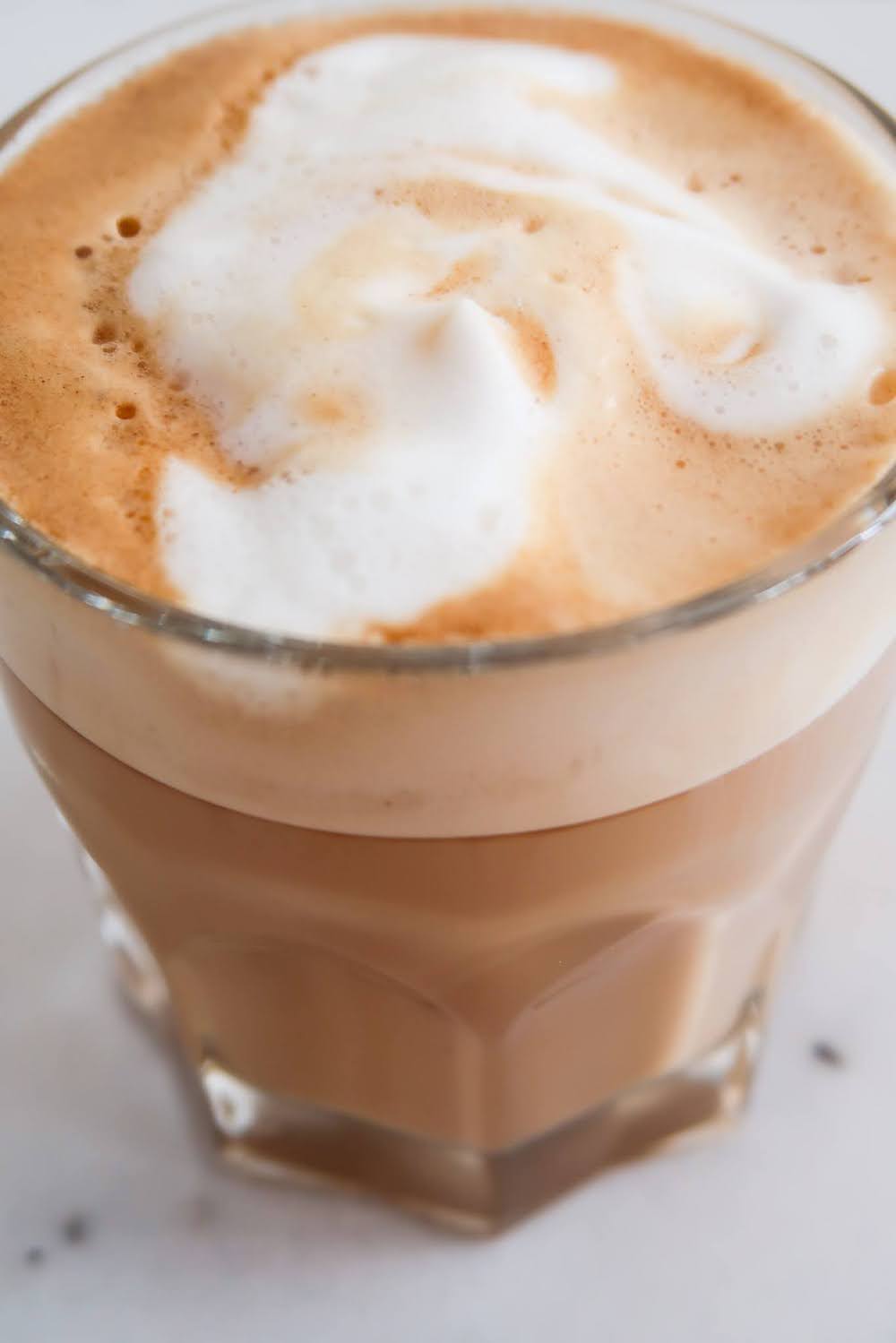 Learn how to make cappuccino or latte at home without a frother or a machine! The result of this super easy cappuccino recipe will be a cup of cappuccino with thick creamy foam that stays a long time.