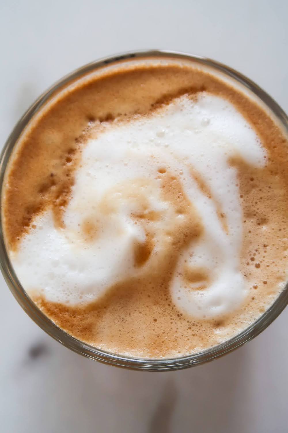 Learn how to make cappuccino or latte at home without a frother or a machine! The result of this super easy cappuccino recipe will be a cup of cappuccino with thick creamy foam that stays a long time.