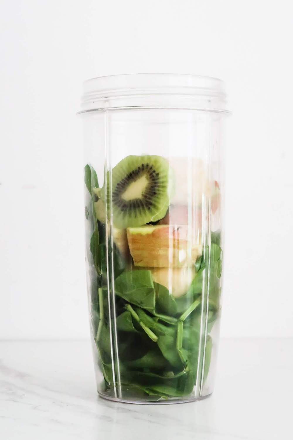 Refreshing apple kiwi green smoothie recipe! Make a batch of this simple green smoothie for a quick low-calorie breakfast or a healthy snack that will make you feel great!