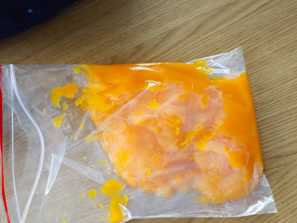 place pumpkin puree into bags