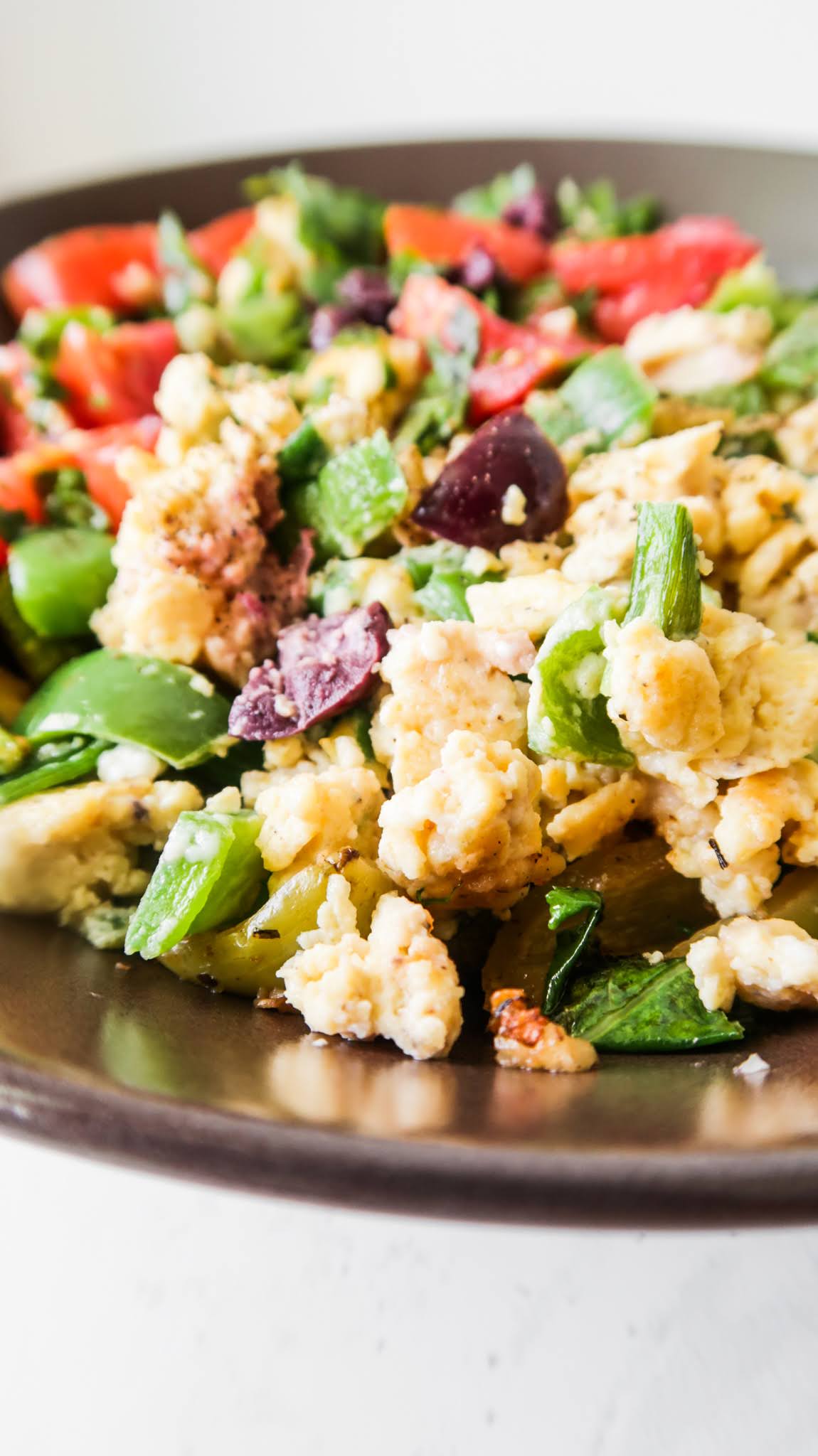 Mediterranean Breakfast Bowl! This healthy egg breakfast is super tasty and quite easy to make. You'll need some eggs, feta cheese, olives and the vegetables that you like!