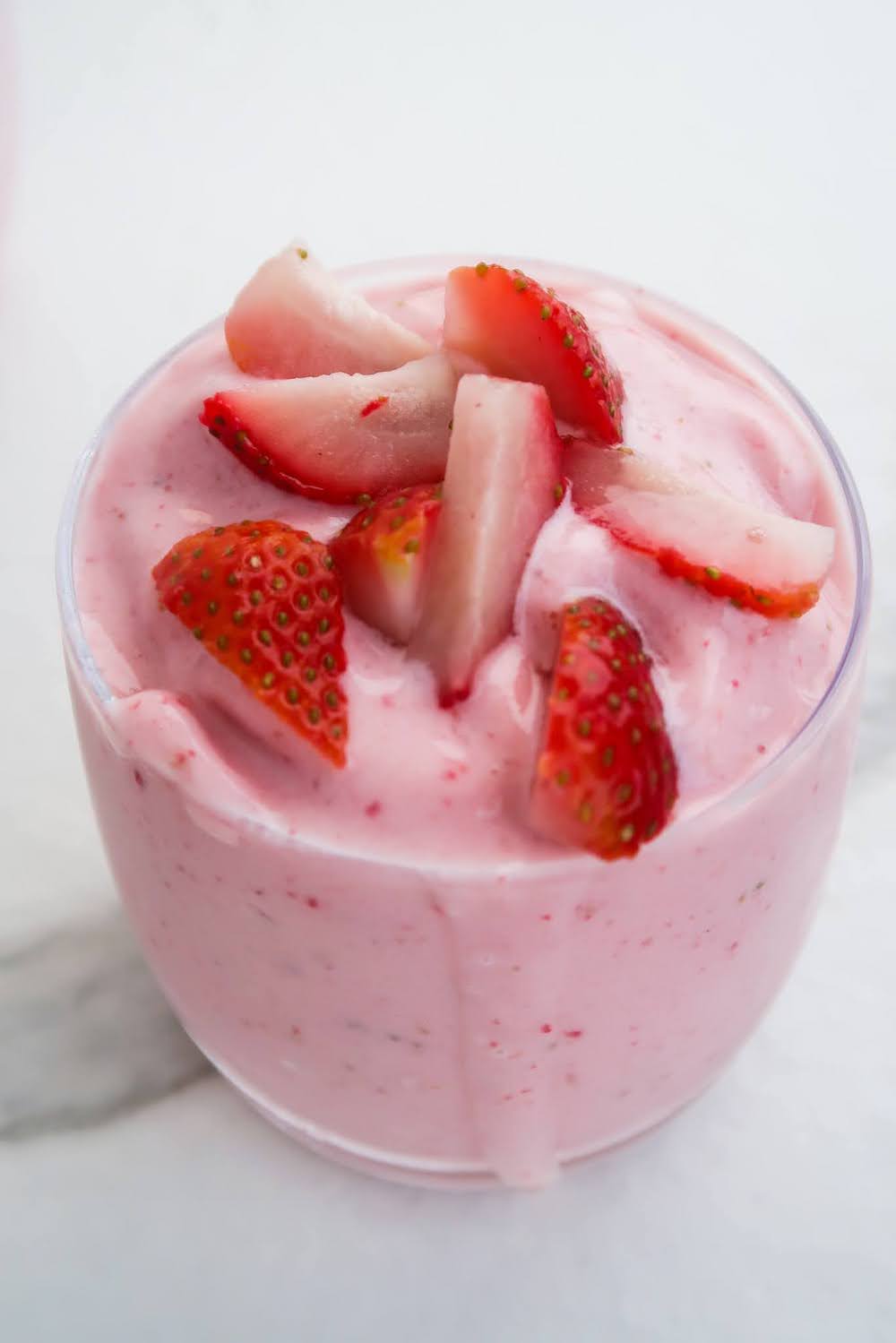 This is the best strawberry smoothie, with 3 ingredients, 2 of them being frozen strawberries and banana, it is healthy and just delicious.